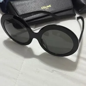 Celine Glossy Black Oversized Sunglasses Celine Triomphe Oversized Sunglasses In Black | Editorialist main image 4